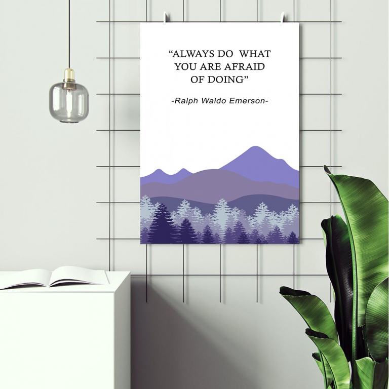 Always Do What You Are Afraid print framed above a desk