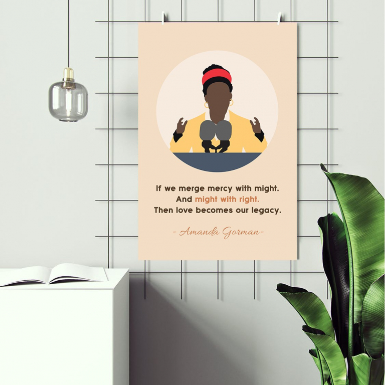 Amanda Gorman poster framed and displayed in a reading nook