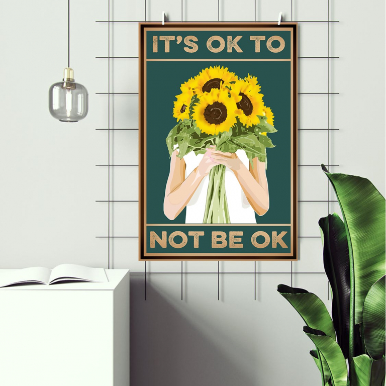 Be Okay print framed and displayed in a living room