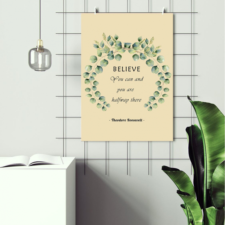 Believe print framed and displayed in a classroom
