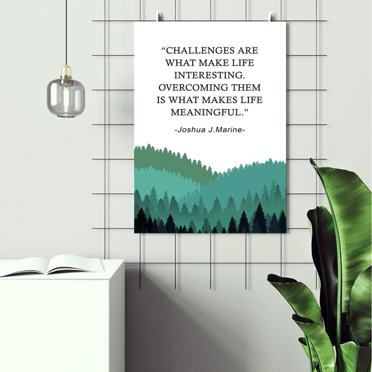 Challenges print framed above a desk