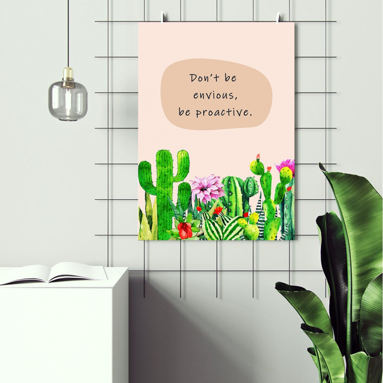 Don't Be Envious print framed and displayed in a classroom