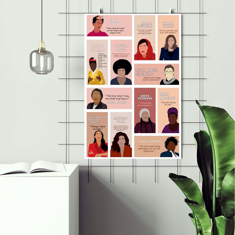 Empowered women poster framed and displayed in a home office