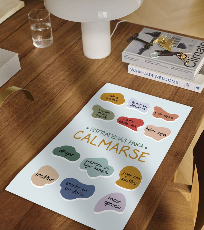 Estrategias para Calmarse calming strategies poster in Spanish framed and displayed in a counseling office