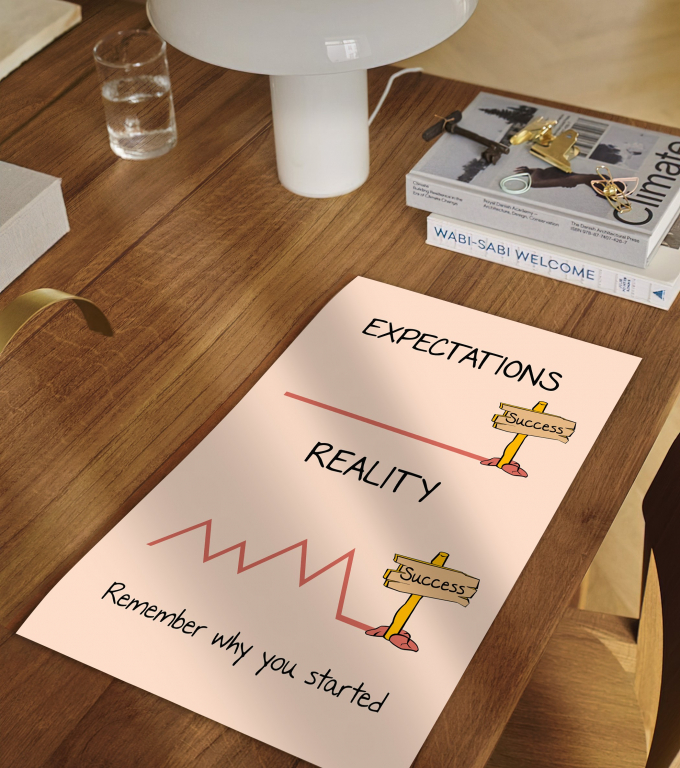 Expectation and Reality boho print framed and displayed in a classroom