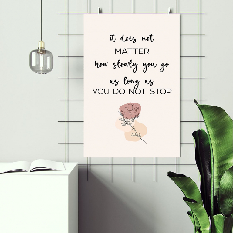How Slowly You Go print framed above a desk