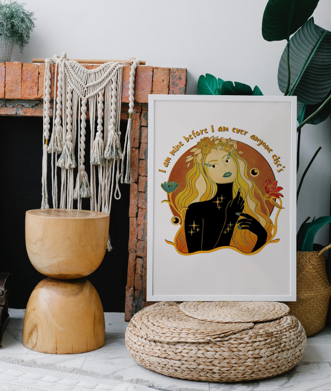 I Am Mine print framed above a bed