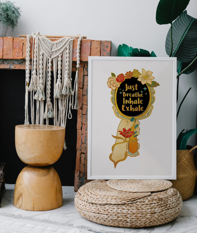 Inhale Joy Exhale Worry print framed above a bed