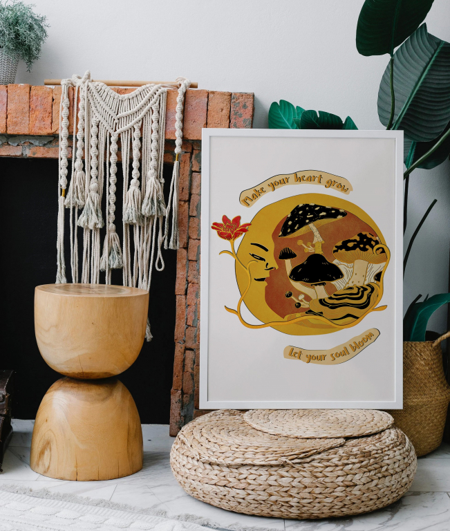 Make Your Heart Grow print framed above a bed