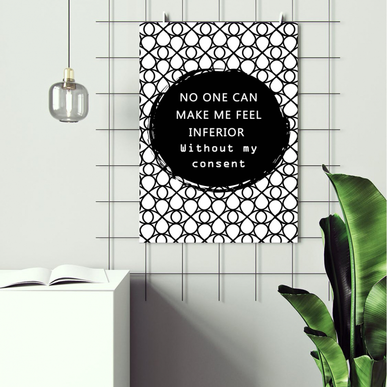 No One Can Make Me Feel Inferior print framed above a desk