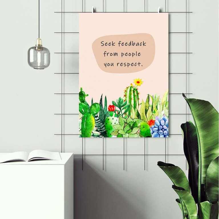 Seek Feedback print framed and displayed in a classroom