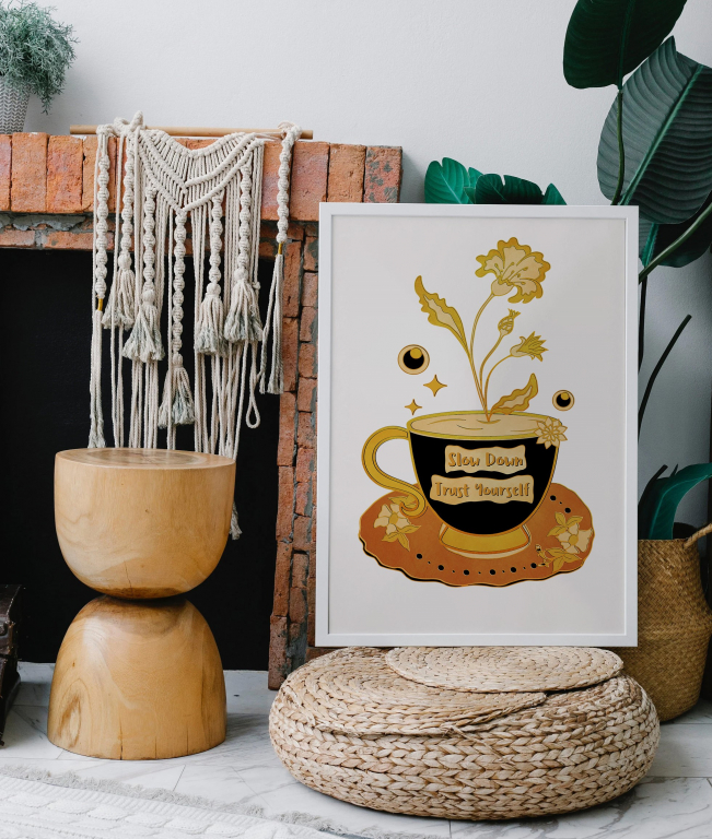 Slow Down and Trust Yourself print framed above a bed