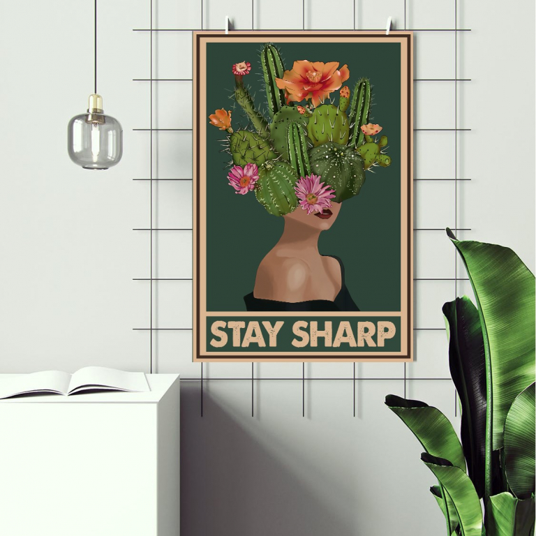 Stay Sharp print framed and displayed in a living room