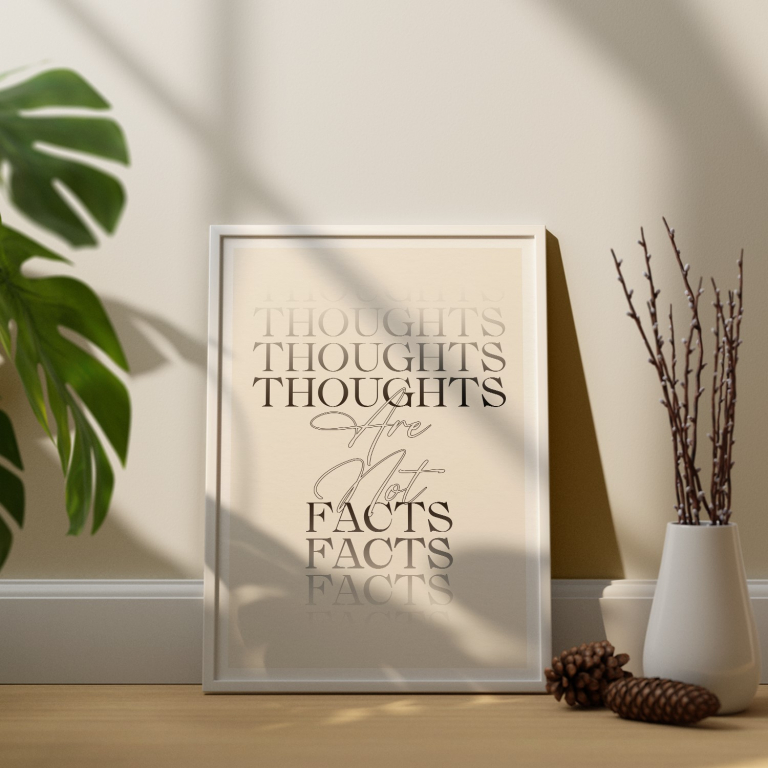 Thoughts Are Not Facts print framed and displayed in a classroom