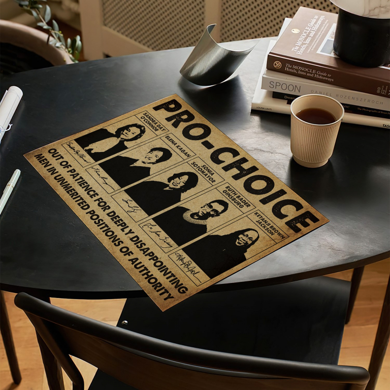 Women's rights poster framed and displayed in a home office