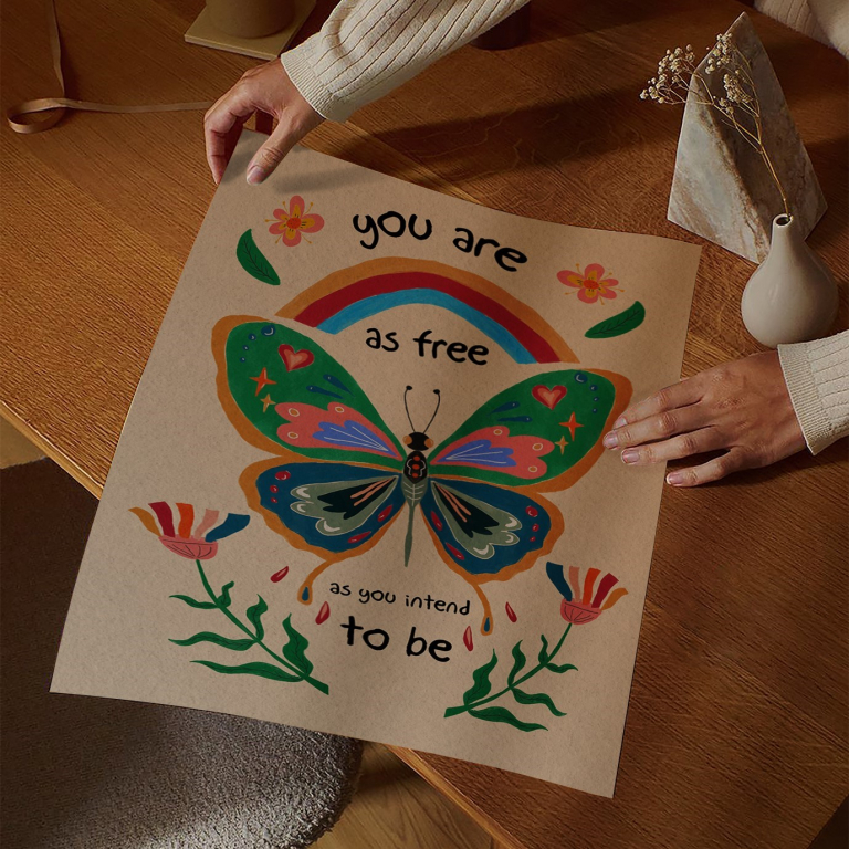 You Are As Free print framed above a bed