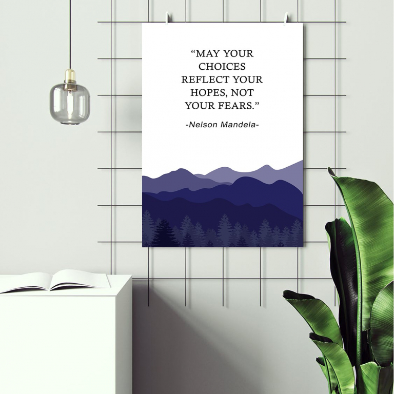 Your Hopes Not Your Fears print framed above a desk